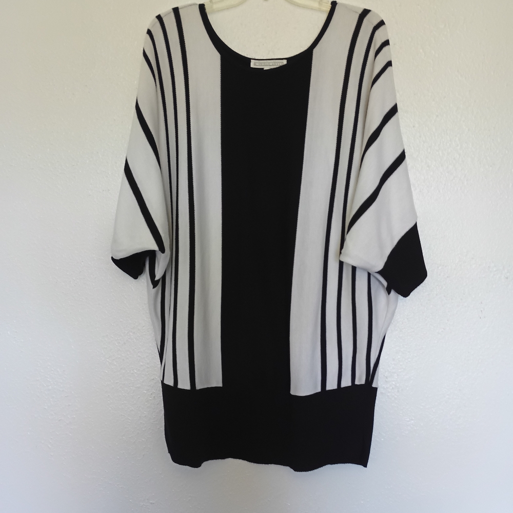 A Knitch Above Black and White Striped Sweater